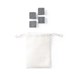 A set of four grey cooling stones next to a small white drawstring pouch.