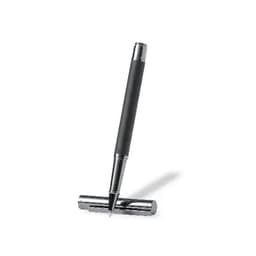A pen with a black barrel and chrome accents, positioned vertically over its chrome cap.