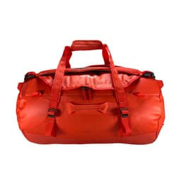 A duffle bag in vibrant red, featuring multiple handles and zippers, with a brand logo present.