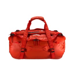A duffel bag in bright red with multiple handles and zippers, featuring a logo on the front.