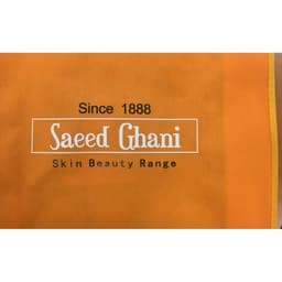An orange non-woven sling bag featuring a logo and text related to skin beauty.