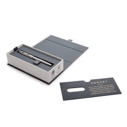A metal rollerball pen in brushed stainless steel, presented in a grey box with a decorative card.