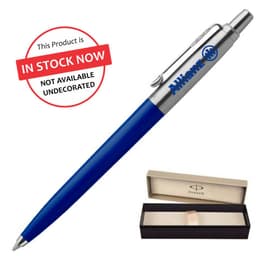 A navy blue ballpoint pen with a silver clip, presented in a black and cream box, featuring a logo.