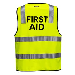 A high-visibility yellow vest with reflective strips, featuring the words "FIRST AID" on the back.