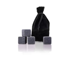A black velvet bag with six grey gin stones arranged in front. The bag features a drawstring closure.