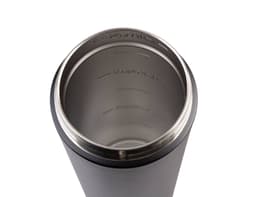 A drink bottle with a stainless steel interior and a matte black exterior, featuring measurement markings inside.