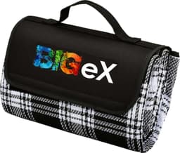 A black and white checkered picnic rug with a handle and a logo on the front.
