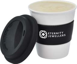 A ceramic coffee mug in white with a black silicone sleeve and lid, featuring a logo.