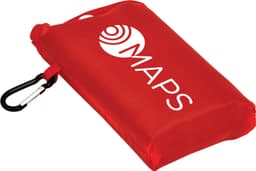 A compact red picnic mat with a carabiner clip and a logo on the surface.