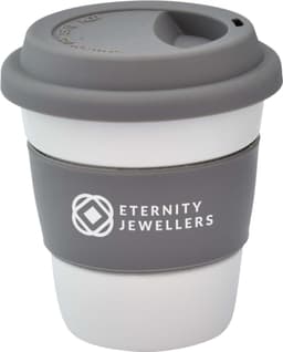 A reusable ceramic mug in white and grey, featuring a silicone lid and grip band, with a logo on the side.