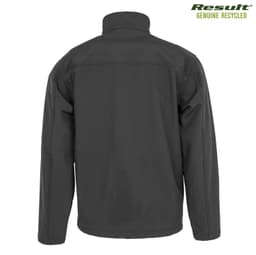 A black softshell jacket with a high collar and long sleeves, featuring a branding logo on the upper right.