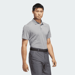 A grey polo shirt on a male model, featuring a collar and short sleeves, with a branding logo.