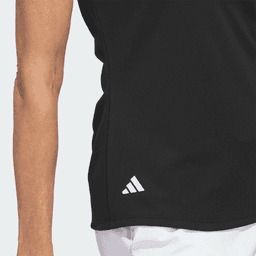 A black polo shirt featuring a logo, designed for women's activewear with a fitted silhouette.