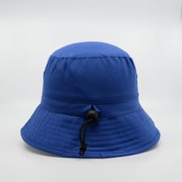 A blue microfibre bucket hat with a drawstring, featuring a round crown and a wide brim, and a branding logo.