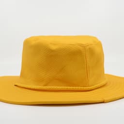 A wide-brimmed hat in bright yellow, featuring a textured band and a solid design. It has a logo on it.