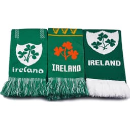Three green custom knitted scarves featuring various designs, including shamrocks and the word "Ireland."