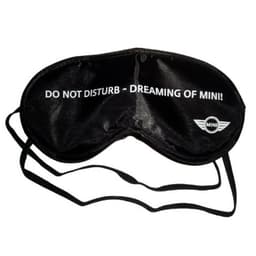 A black eye mask with a strap, featuring text and a logo on the front.