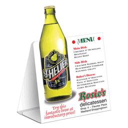 A table tent featuring a menu with a yellow drink bottle and a list of dishes in white and green.