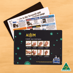 A countertop mat featuring hygiene instructions with a dark background, green graphics, and a logo.
