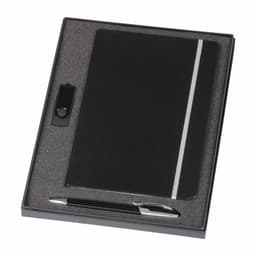 A black notebook with a silver stripe and a pen, presented in a fitted black box with a foam insert.
