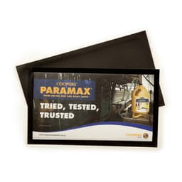 A black bar mat featuring a promotional graphic with a logo and text for a cattle product.
