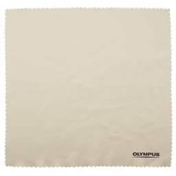 A large beige microfibre cleaning cloth with a scalloped edge and a logo in one corner.