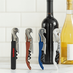 A drink bottle opener in four colours: black, brown, blue, and white, with a metal corkscrew and a logo.