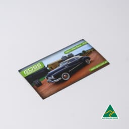 A rectangular fridge magnet featuring a classic black car with a green logo and an Australian Made badge.