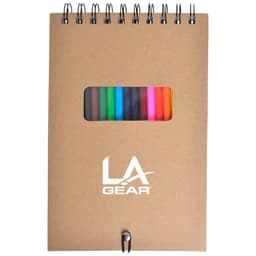 A spiral-bound notebook with a kraft cover featuring a transparent window displaying several colourful markers inside.