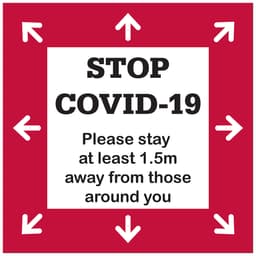 A red floor decal sticker featuring white arrows and black text promoting social distancing measures.