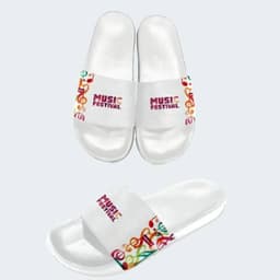 A pair of white slides featuring a vibrant patterned strap with a logo. The slides have a glossy finish.