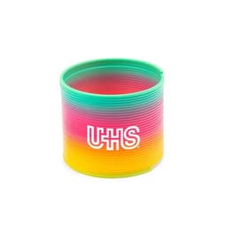 A colourful slinky featuring a gradient of pink, yellow, and green colours with a logo printed on it.
