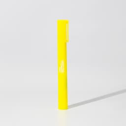 A bright yellow jumbo highlighter with a clip and a branding logo.