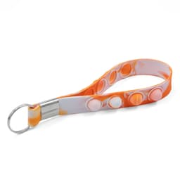 An orange and white popper stress reliever keychain with multiple popping buttons and a metal keyring.