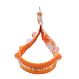 An orange and white silicone keychain featuring popper elements, with a metal keyring attachment.