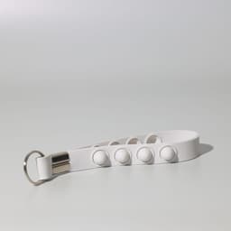 A white Popper Stress Reliever Key Chain featuring multiple push buttons and a metal keyring.
