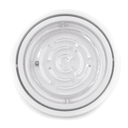 A circular fidget toy in clear plastic featuring a spiral maze design with a small ball inside.