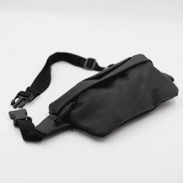 A black Boston Bag with an adjustable strap and a zippered pocket, featuring a simple and sleek design.