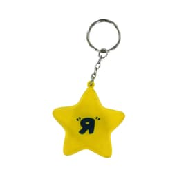 A yellow star-shaped stress reliever attached to a keyring, featuring a small symbol in black.