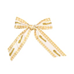 A satin narrow scarf in a yellow and white gingham pattern, tied in a bow, featuring a brand logo.