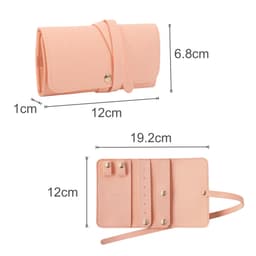 A synthetic leather jewellery bag in a soft pink colour, featuring a strap and multiple compartments for accessories.
