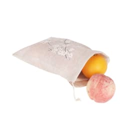 A small beige jute produce bag with floral embroidery, containing an orange and an apple.