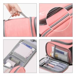 A pink travel storage bag with a handle, featuring mesh pockets and compartments for organisation.