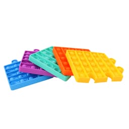 A stack of Puzzle Shape Pop It fidget toys in purple, blue, green, orange, and yellow colours.