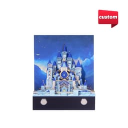 A 3D paper art notepad in blue and white, featuring a detailed castle design with towers and a scenic backdrop.