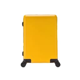 A yellow wheeled business suitcase with a sleek design and four wheels for easy manoeuvrability.