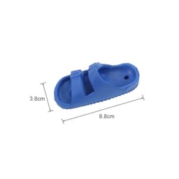 A blue fridge magnet shaped like a flip-flop, measuring 8.8 cm in length and 3.8 cm in width.