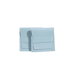 A light blue PU leather flip jewelry pouch, featuring a fold-over design and a front pocket. Two pouches are displayed.