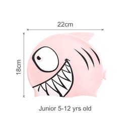A pink silicone swim cap featuring a fish design with a smiling face and sharp teeth. Measures 22cm by 18cm.