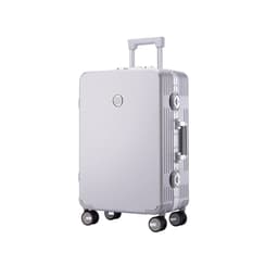 A ribbed ABS suitcase in white with four wheels and a retractable handle, featuring a logo on the front.